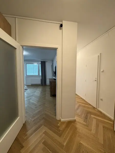 Eleganz am Schwedenplatz – Maßgeschneiderter Wohntraum mit Blick auf die Stadt
