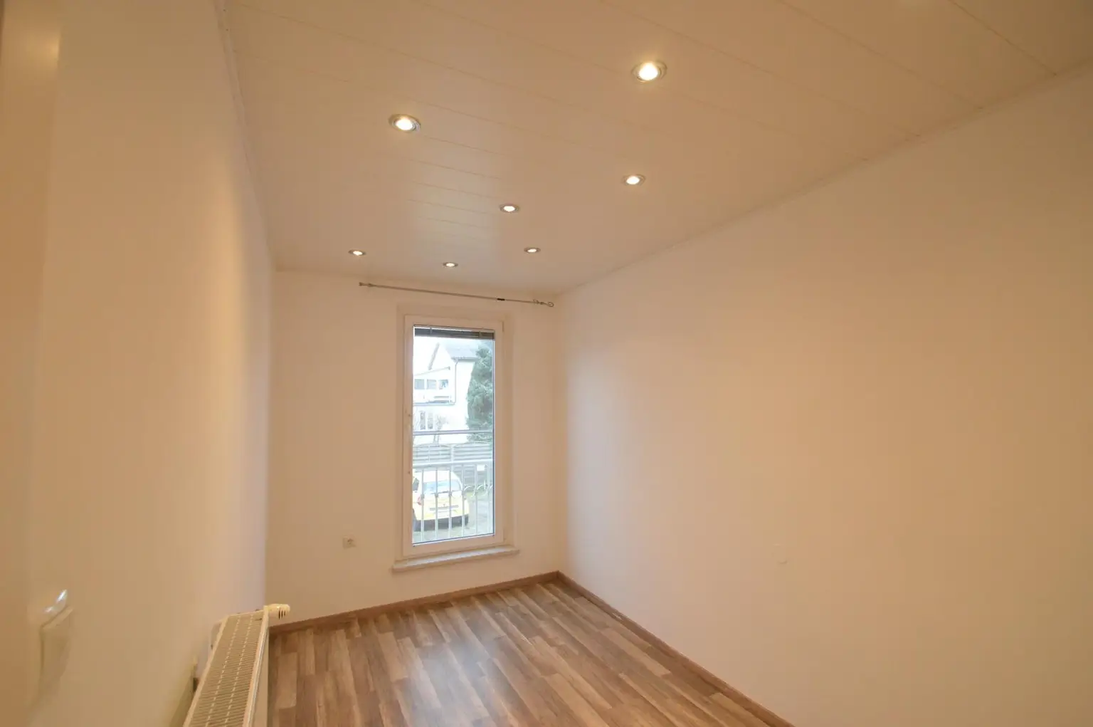 Zimmer mit französischem Balkon