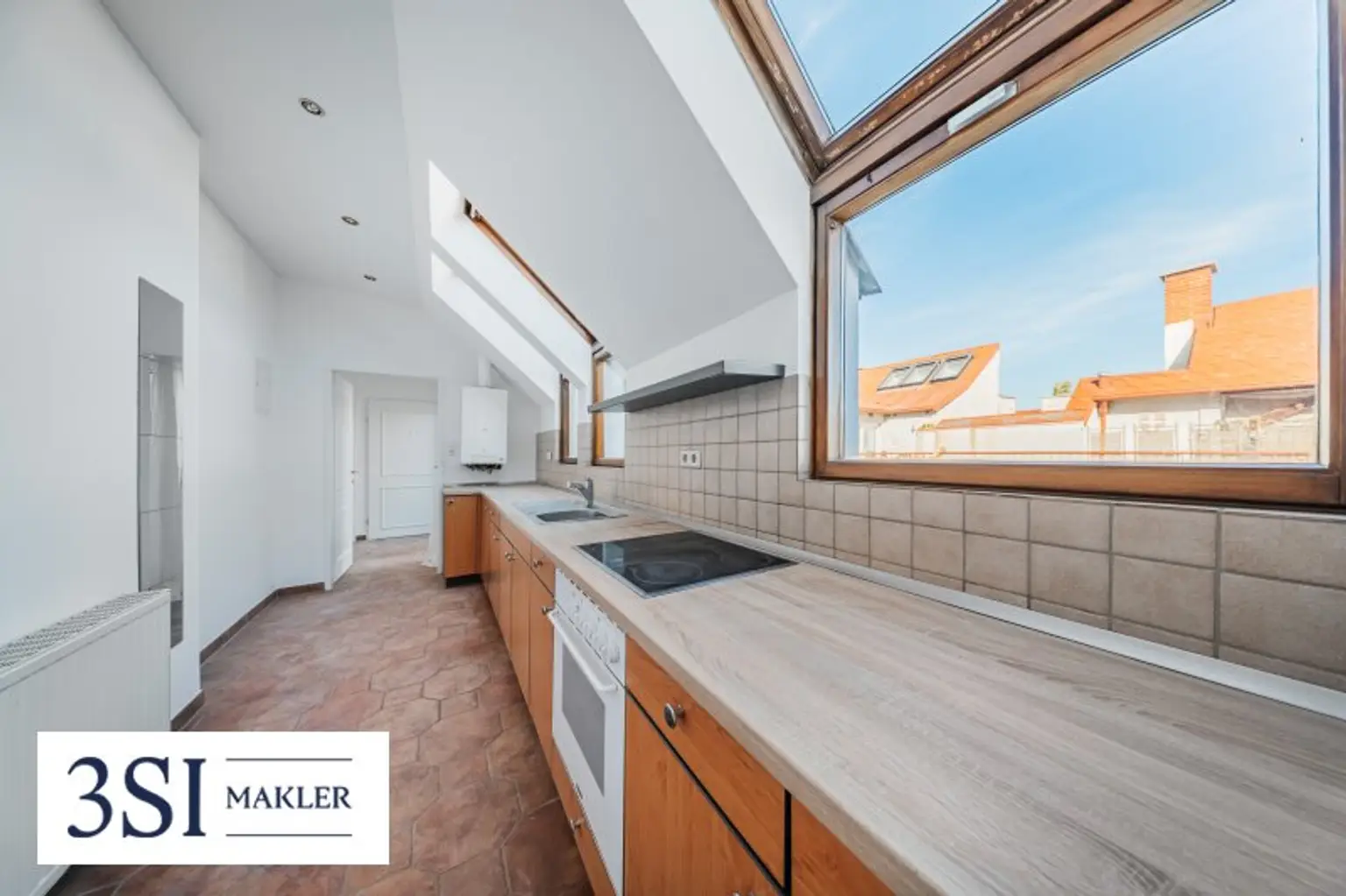 Klausgasse 46: Helle 1,5-Zimmer-Dachgeschoßwohnung mit hofseitiger Terrasse