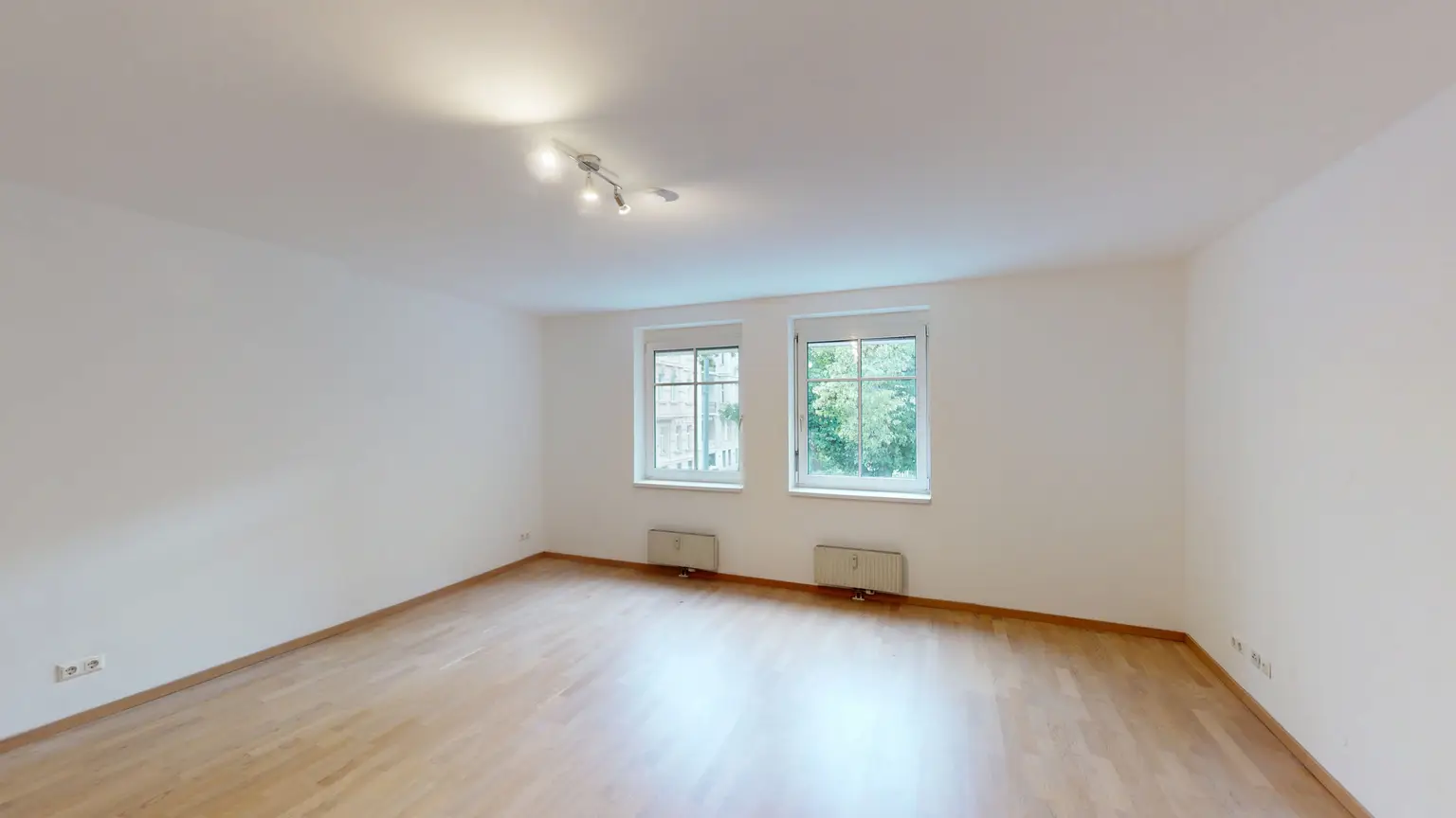 Helle 2,5-Zimmer-Wohnung im 2. Liftstock – ruhige Lage mit Grünblick & optionalem Garagenplatz