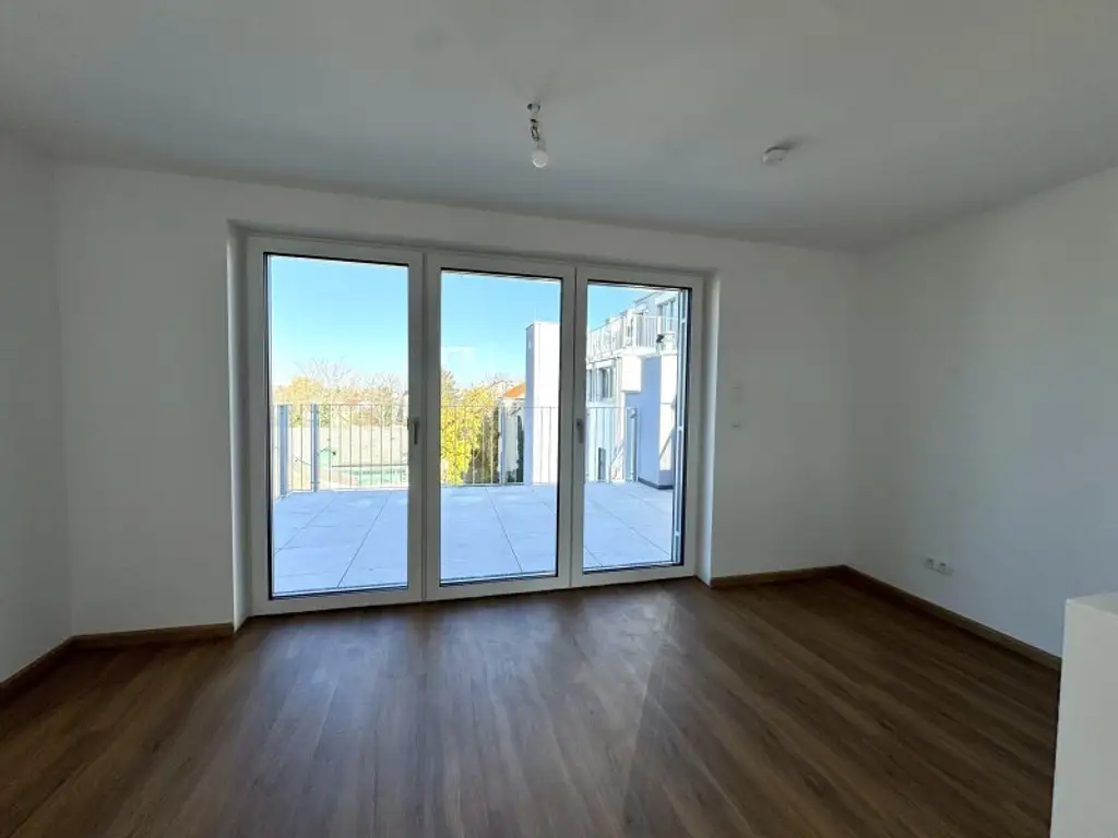 2 Zimmer DG Wohnung mit separatem Arbeitsbereich - großzügige Terrasse & Klimaanlage - Erstbezug - UNBEFRISTETE Mietdauer