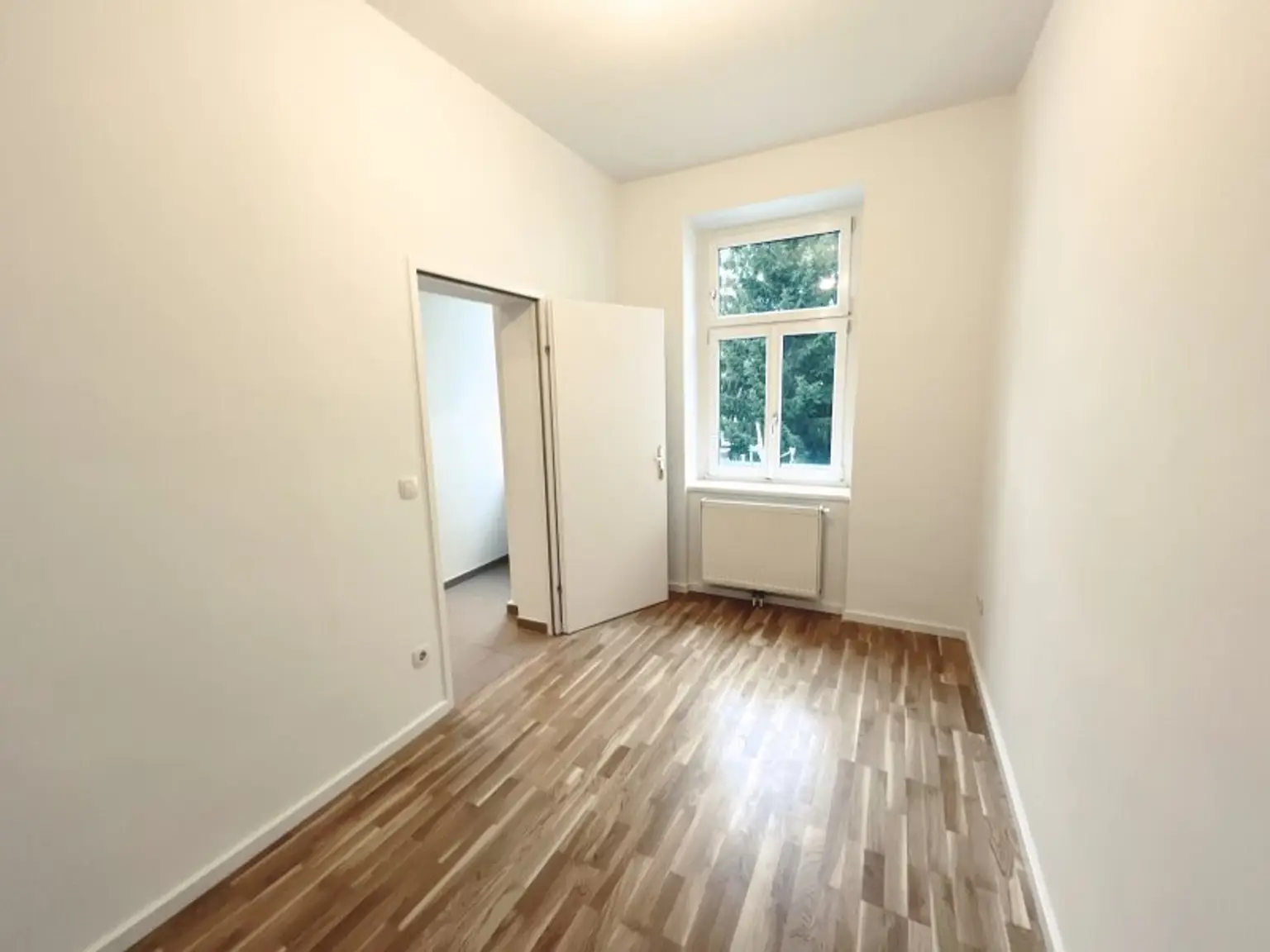 Freundliche und effiziente 3-Zimmerwohnung in schön saniertem Haus