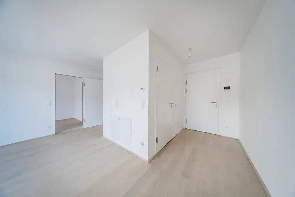 Moderne Stadtwohnung im 6. Stock mit Balkon – Erstbezug