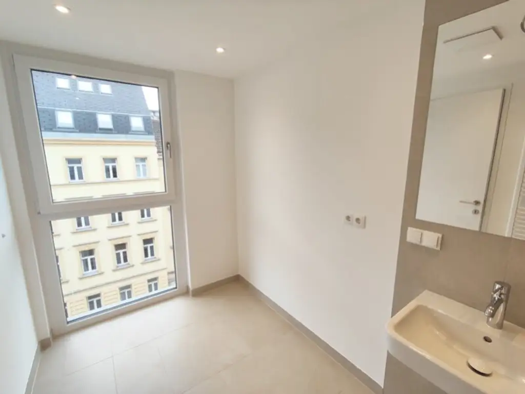 Modern wohnen in Meidling! Neubau 2-Zimmer-Erstbezug mit Balkon im 5. Liftstock - Top60
