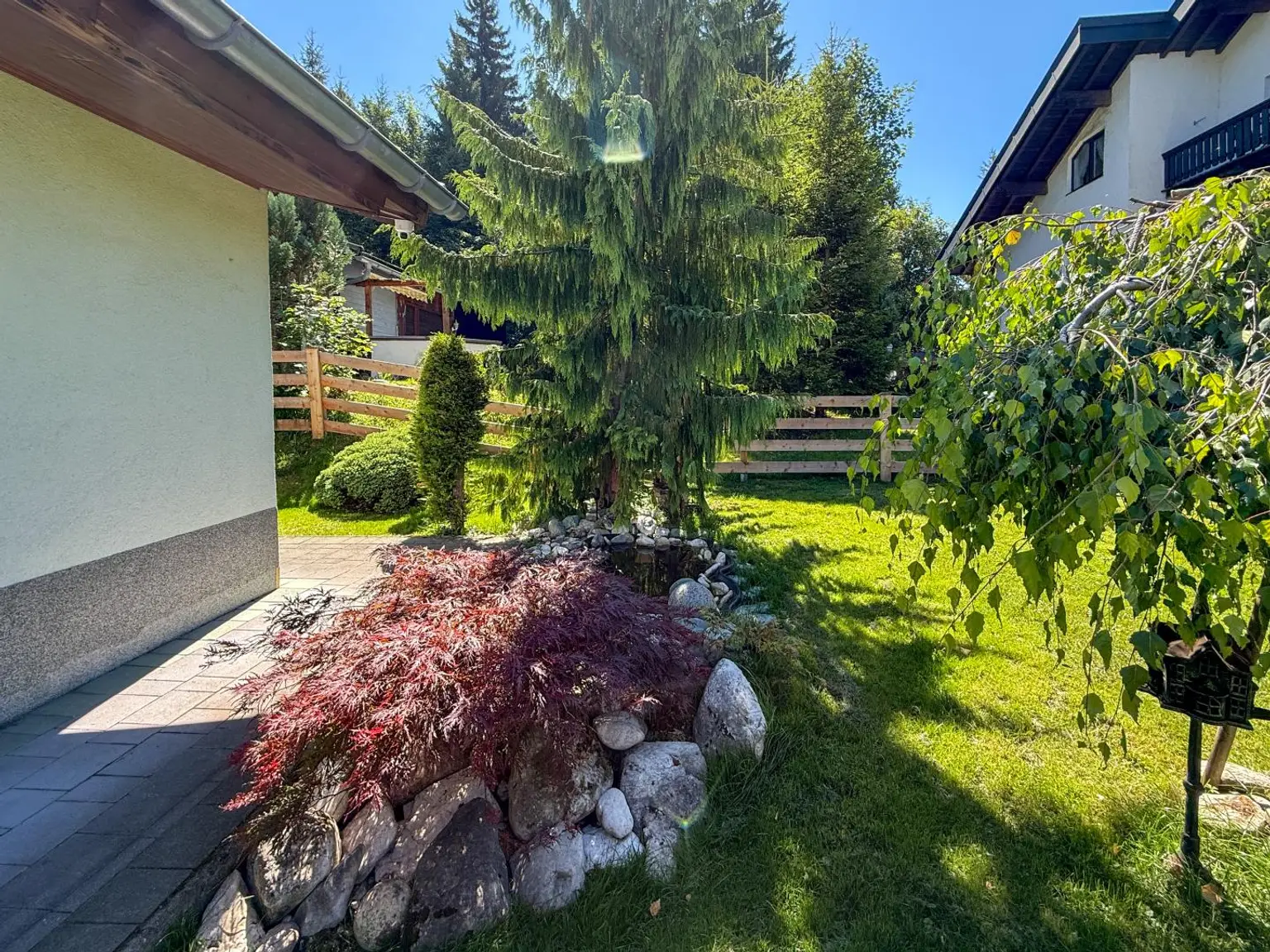 Wohnen in Seefeld – Bungalow mit Gartenidylle und Doppelgarage