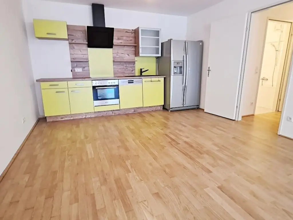 EIGENGARTEN, LORYSTRASSE, 75 m2 Neubau mit 23 m2 Garten, 2 Zimmer, Wohnküche, Wannenbad, Parketten, 1. Liftstock