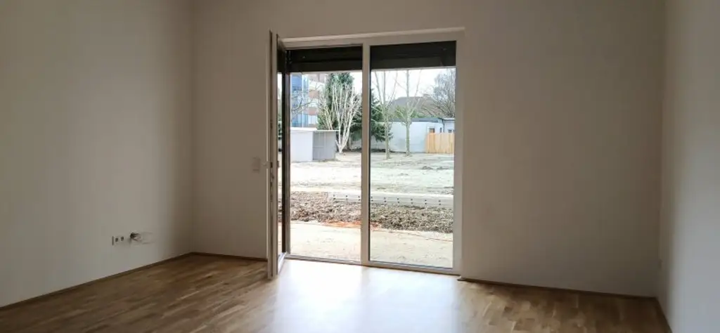 NEUBAU - ERSTBEZUG - Top 5 - Wunderschöne 2 Zimmerwohnung mit Terrasse, kleinem Garten und eigenem Tiefgaragenplatz