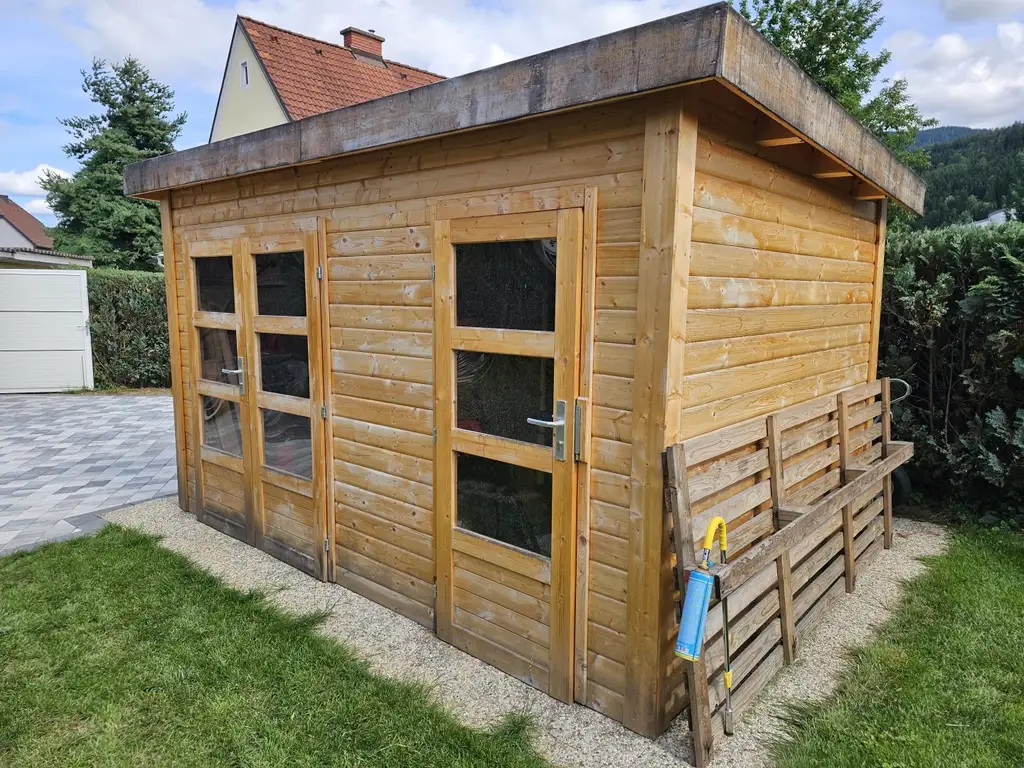 Einfamilienhaus mit Garage,mit winterfestem Gartenhaus, Werkstätte u.a