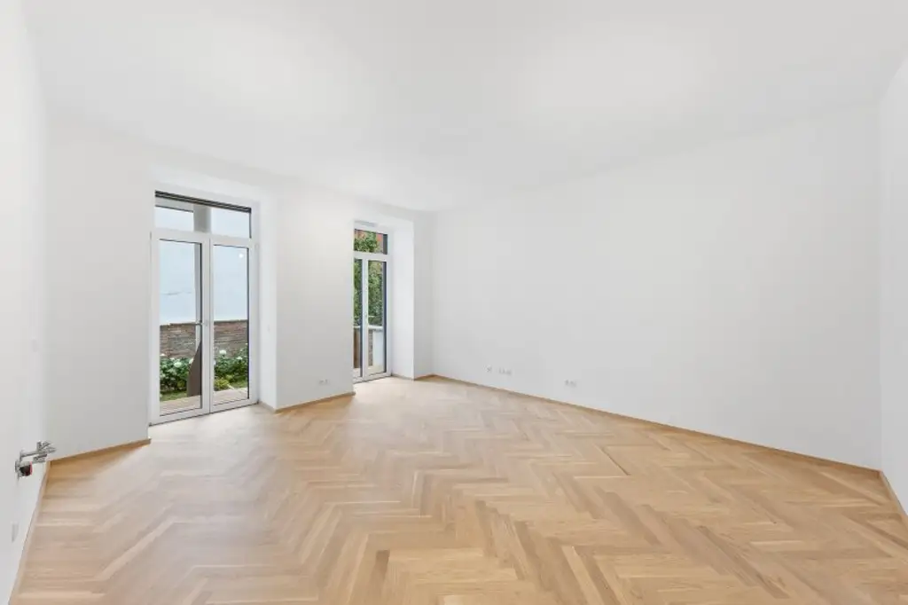 3-Zimmer-Altbaueigentumswohnung in generalsaniertem Altbau mit Terrasse und Garten