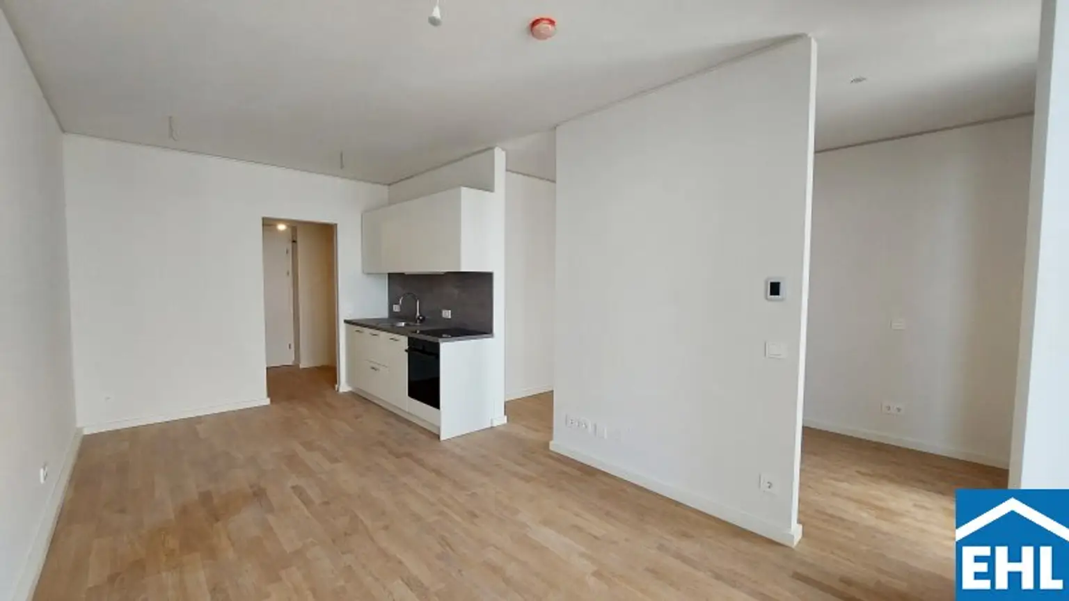 1,5-Zi.-Erstbezug mit Loggia & Rooftop Spa | TOWER HOMES im V22