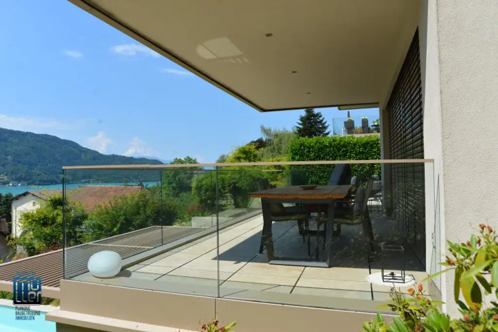 Extravagantes Wohnen am Wörthersee -  152 m² große Seeblickterrassenwohnung mit TG/Carport mit MIETER zu verkaufen!