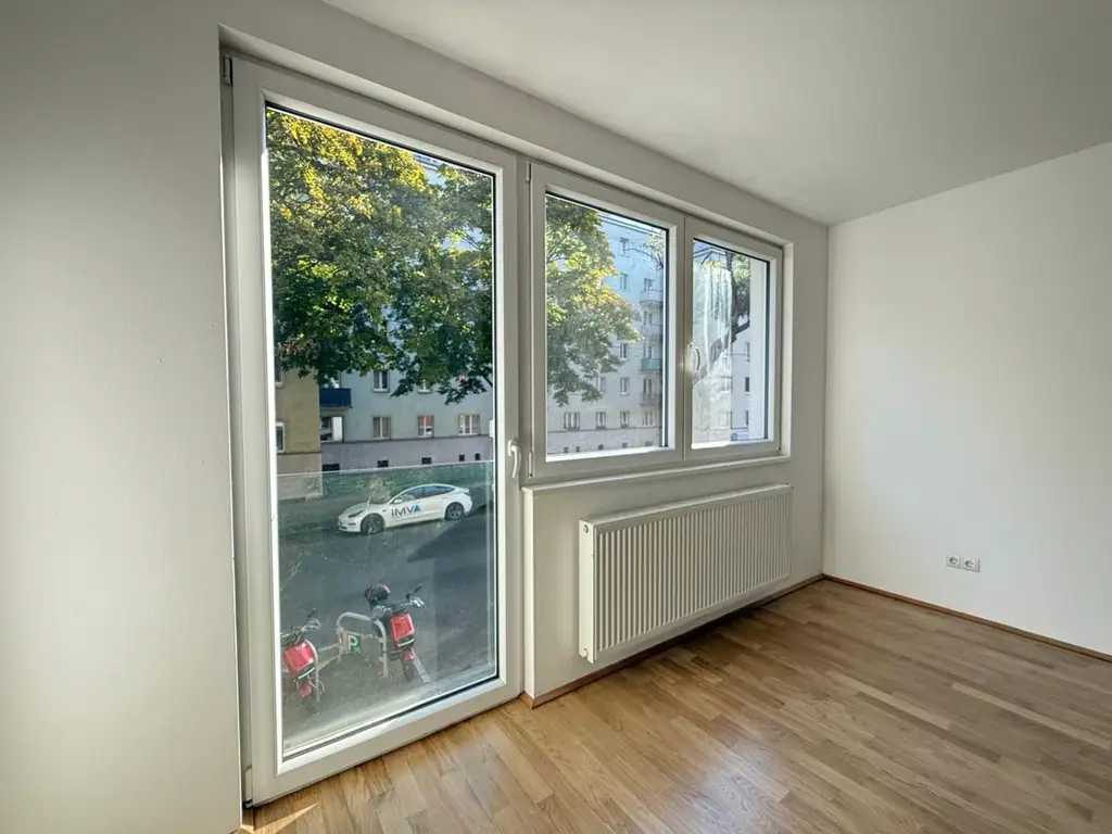 Sonnendeck-Terrasse im Innenhof, schön aufgeteilte 2-Zimmer Neubauwohnung