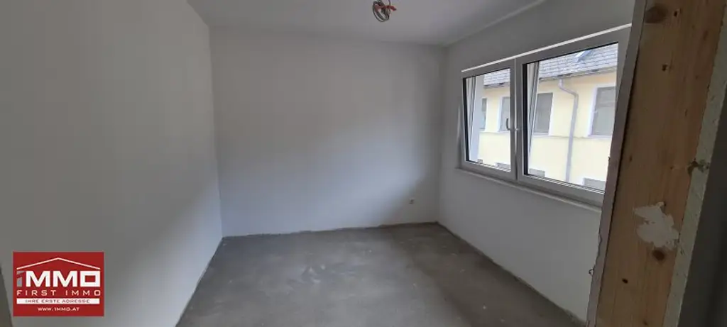 ***ERSTBEZUGS-DOPPELHAUSHÄLFTE DIREKT AM WASSER MIT SÜD-GARTEN!***