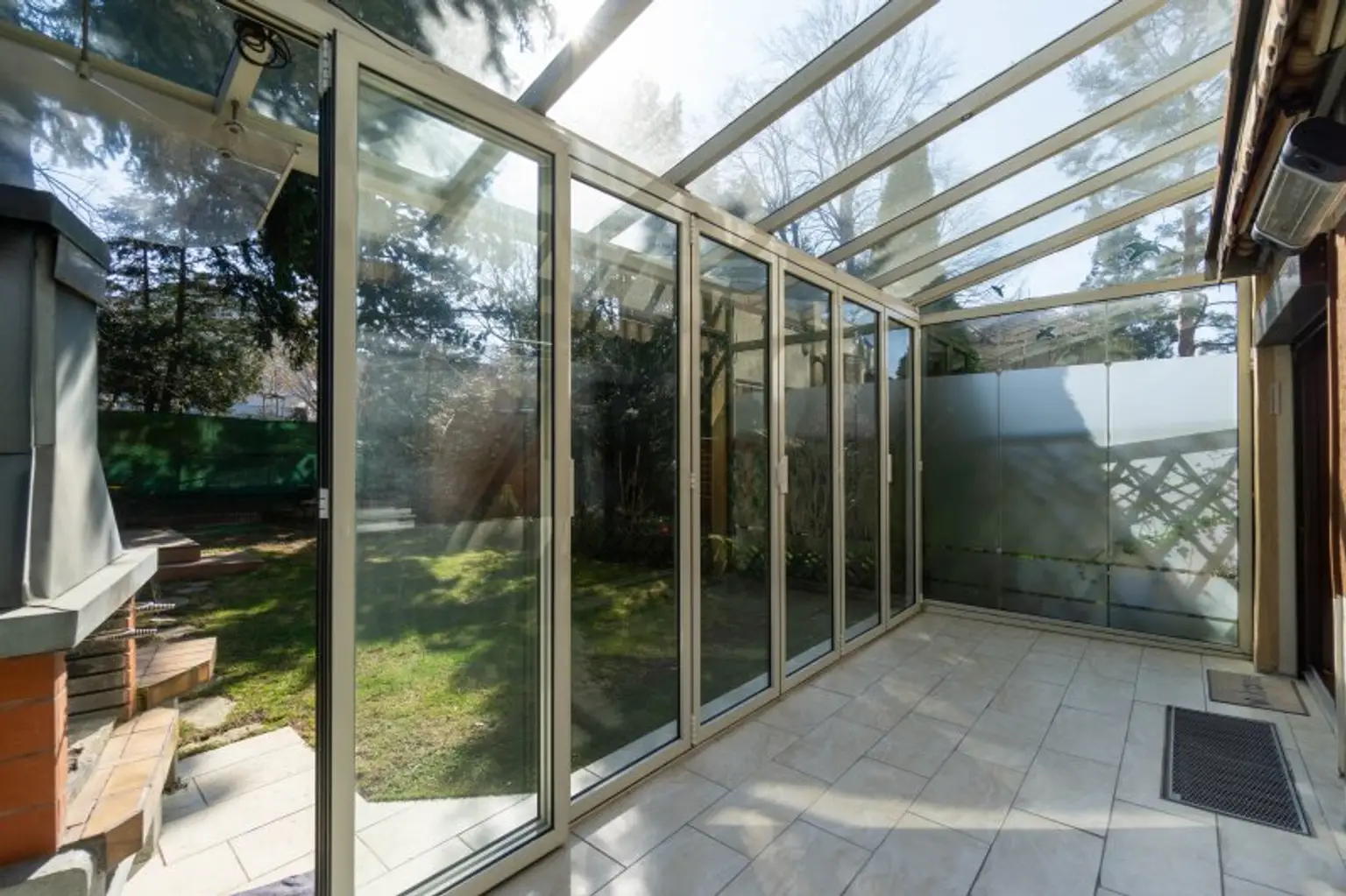 Wintergarten mit Gartenzugang