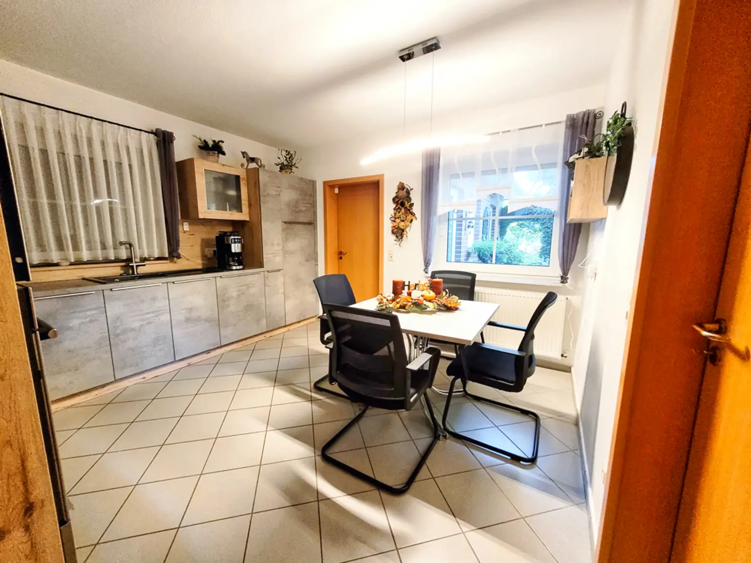 Einfamilienhaus mit traumhafter Gartenanlage in Niederlangen!