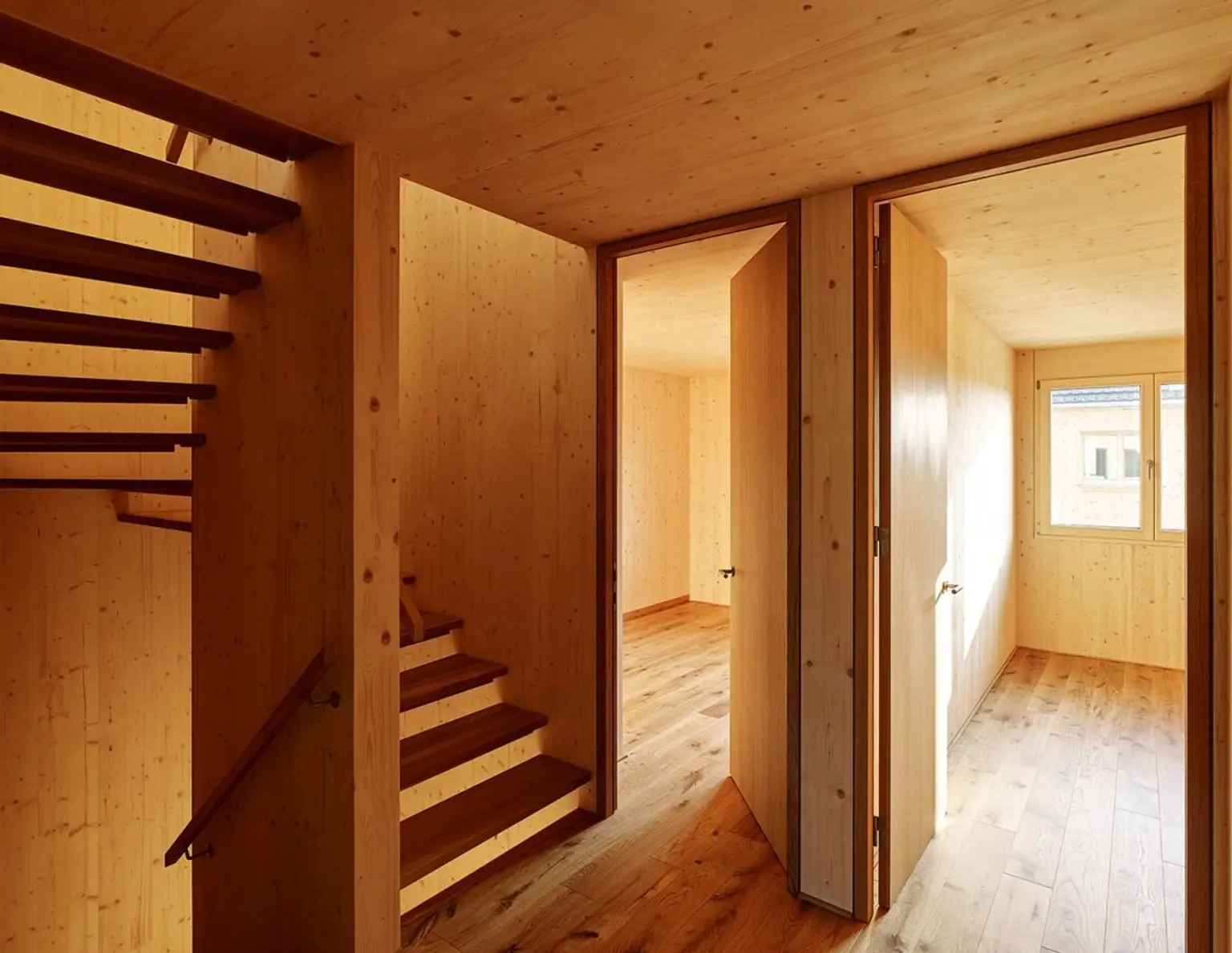 NEU - Feldkirch - Tosters -das großzügige trimana Vollholz Doppelhaus mit großem Garten, Terrasse, Studio und Tiefgarage, Baubeginn in Kürze