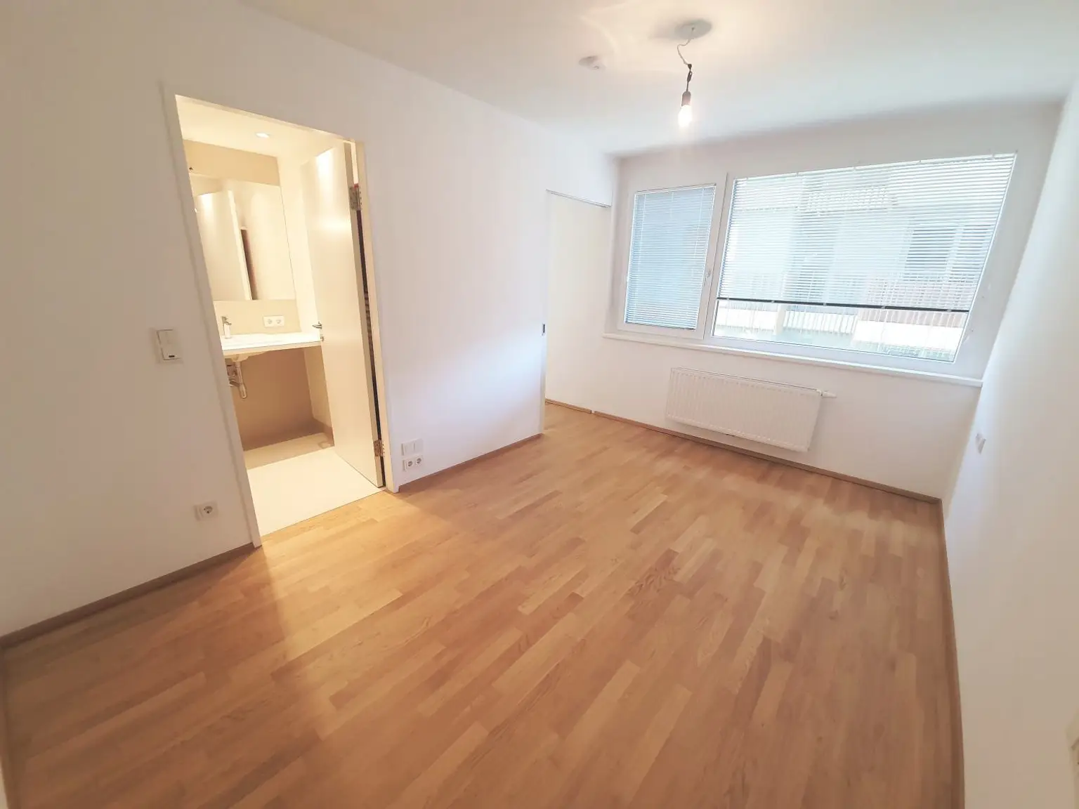 Neubauwohnung mit 2 Zimmern und Balkon im Laend Yard