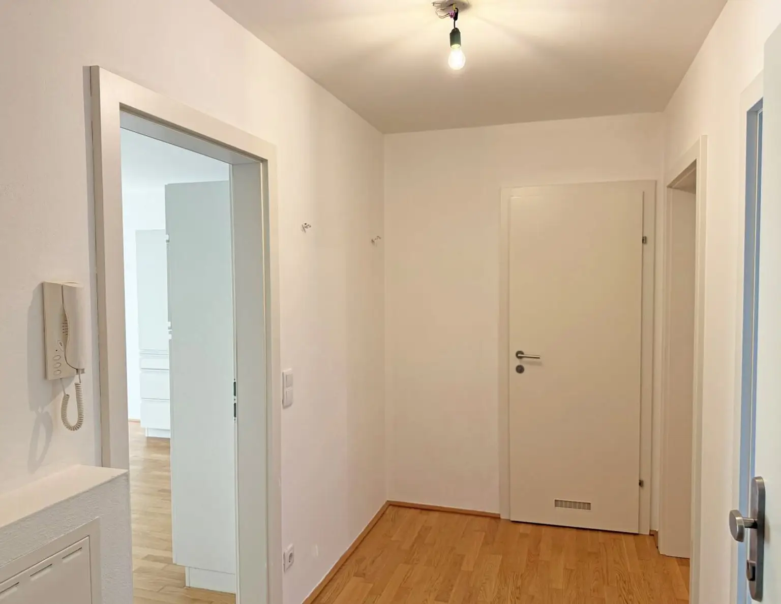 Rif - Moderne 3 Zimmer Gartenwohnung mit Tiefgarage