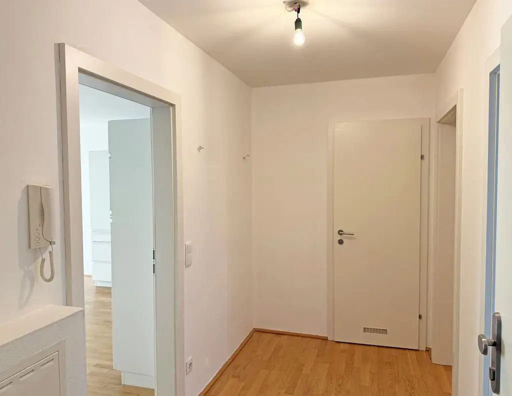 Rif - Moderne 3 Zimmer Gartenwohnung mit Tiefgarage