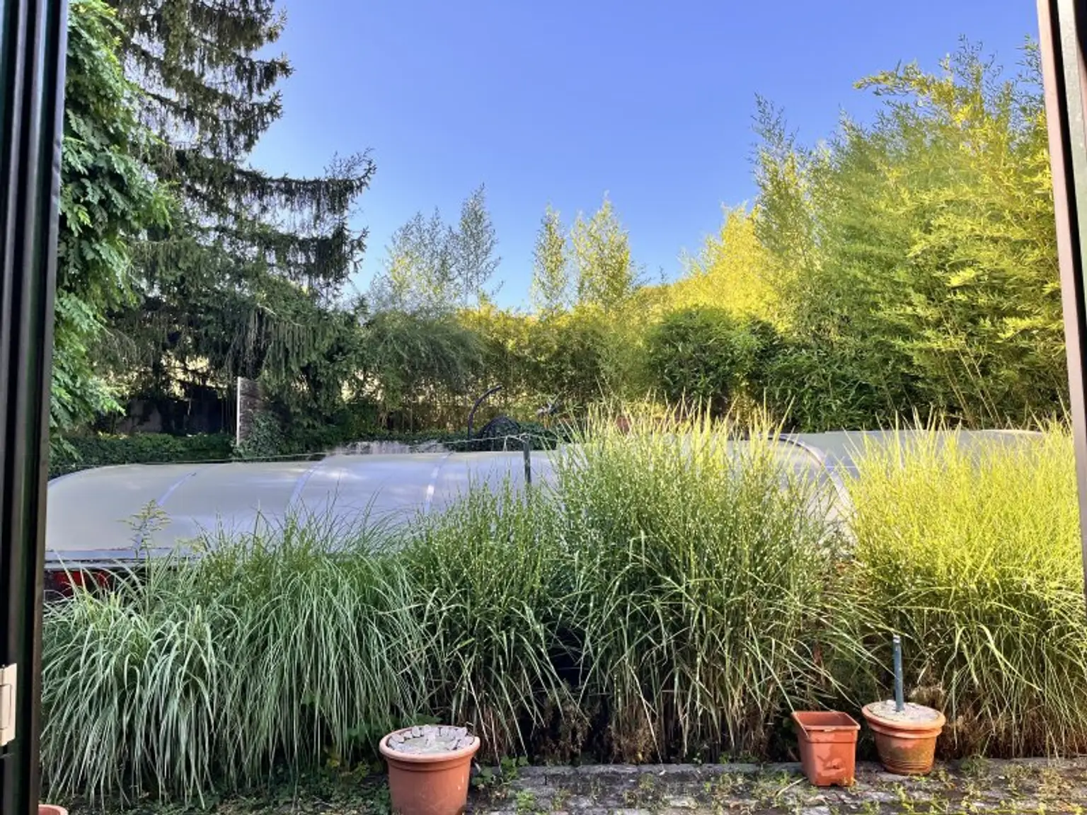 Haus mit Potenzial in Kierling – Ruheoase mit Garten, Pool & Wintergarten