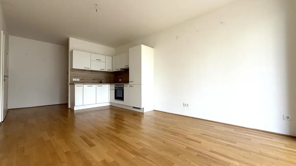 Moderne Neubauwohnung mit EIGENGARTEN und TERRASSE nahe Akademiepark
