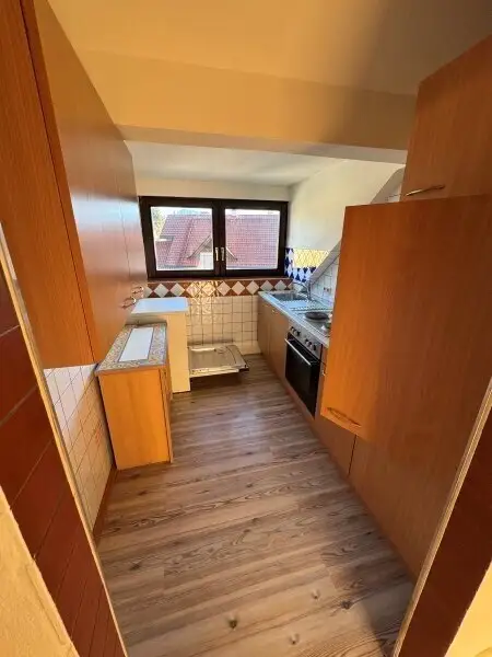 "GRÖDIG - Geräumiges 2,5 Zimmer Appartement im Dachgeschoss mit PKW-Stellplatz"