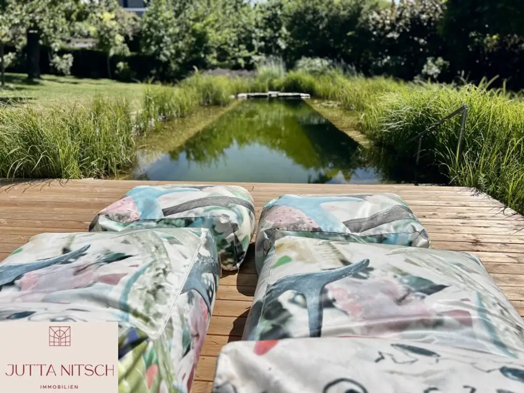 Exquisites Terrassenhaus in Eisenstadt, teilbares Grundstück – Ihr neues Zuhause mit Traumgarten, Naturpool und Weitblick!