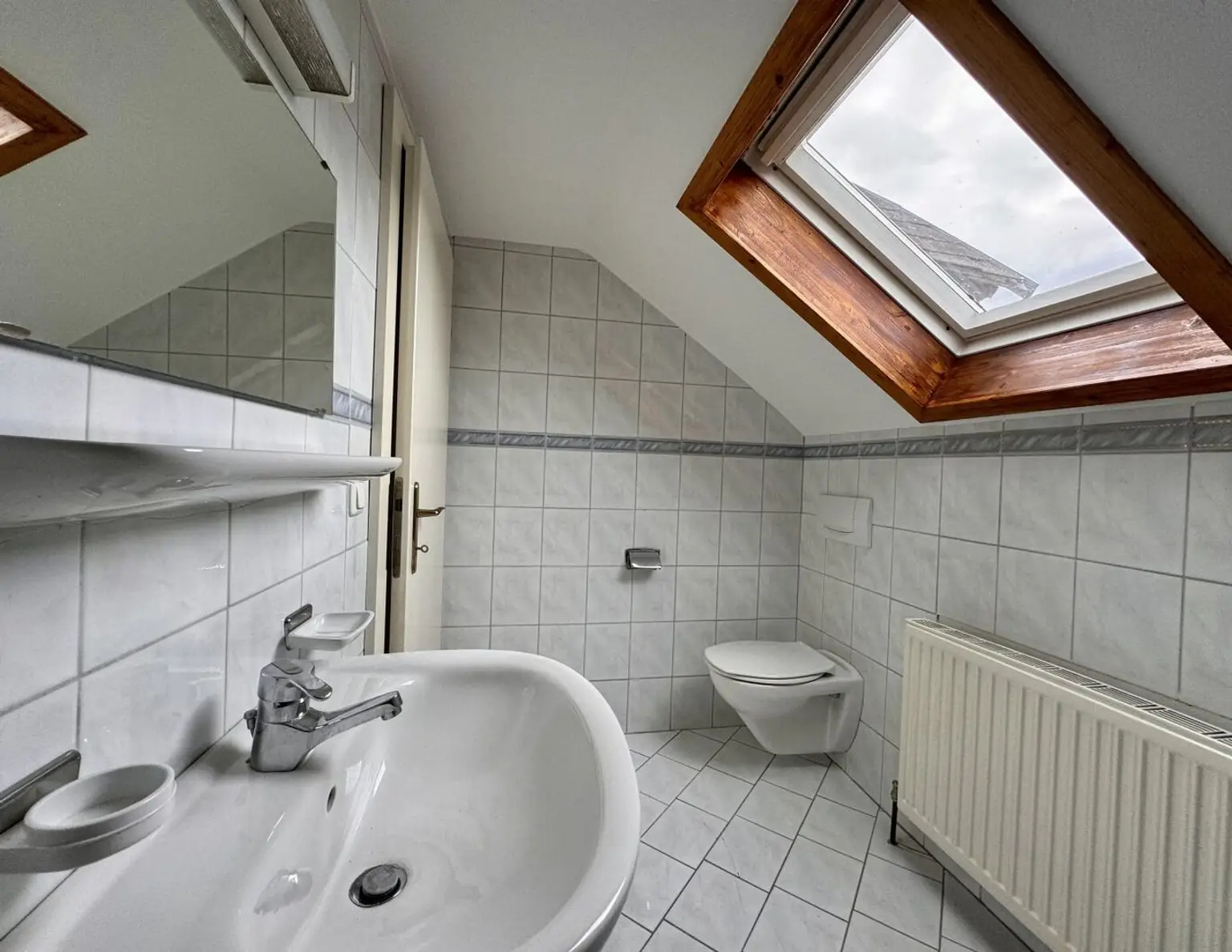 Dachgeschoss trifft Design - wohnen im Herzen von Pettenbach.