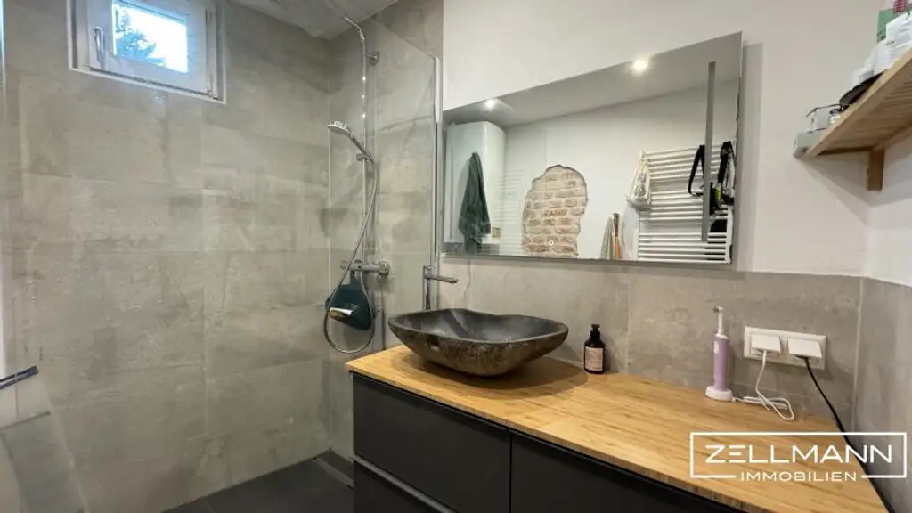 Wohnen am Puls von Mauer – Exklusive Maisonette mit Terrasse und Stil | ZELLMANN IMMOBILIEN