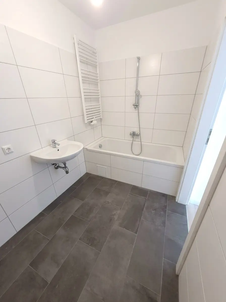 Ein Zuhause zum Verlieben - Neubau: Tolle ca. 65 m² Wohnung mit ca. 64 m² Eigengarten und Terrasse