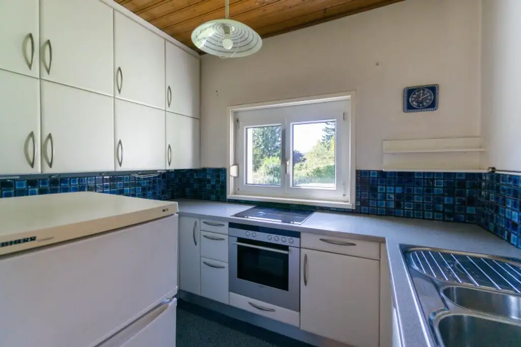 Einfamilienhaus auf sonnigem Doppelgrundstück in fabelhafter Aussichtslage