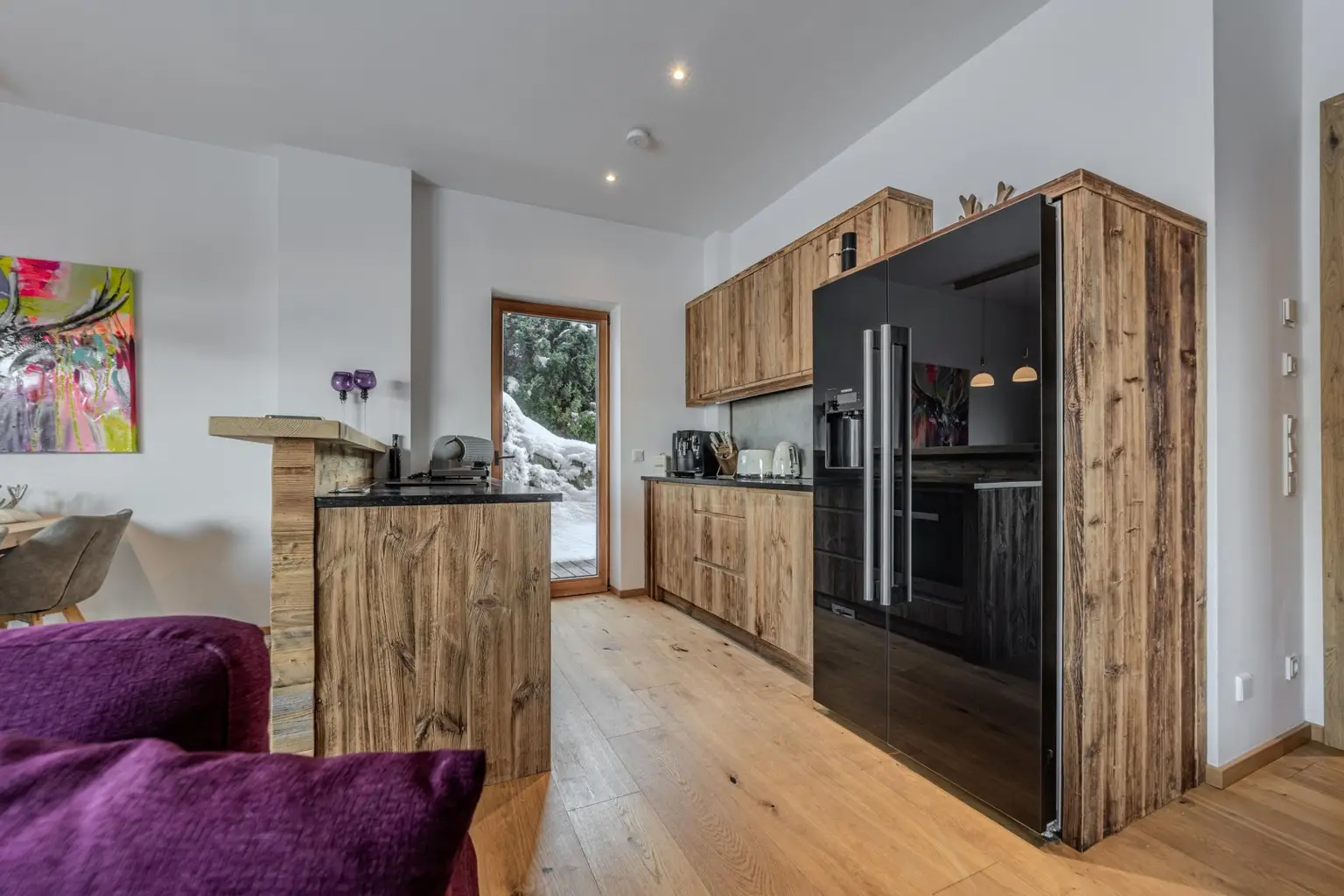 Wohn- Ess- und Kochbereich mit Kamin