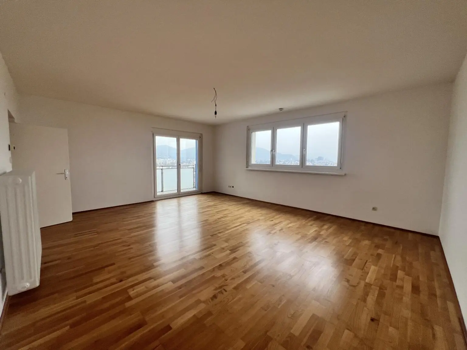 Sanierte 4-Zimmer-Wohnung mit 2 Balkonen und traumhaftem Blick über Graz inkl. Stellplatz