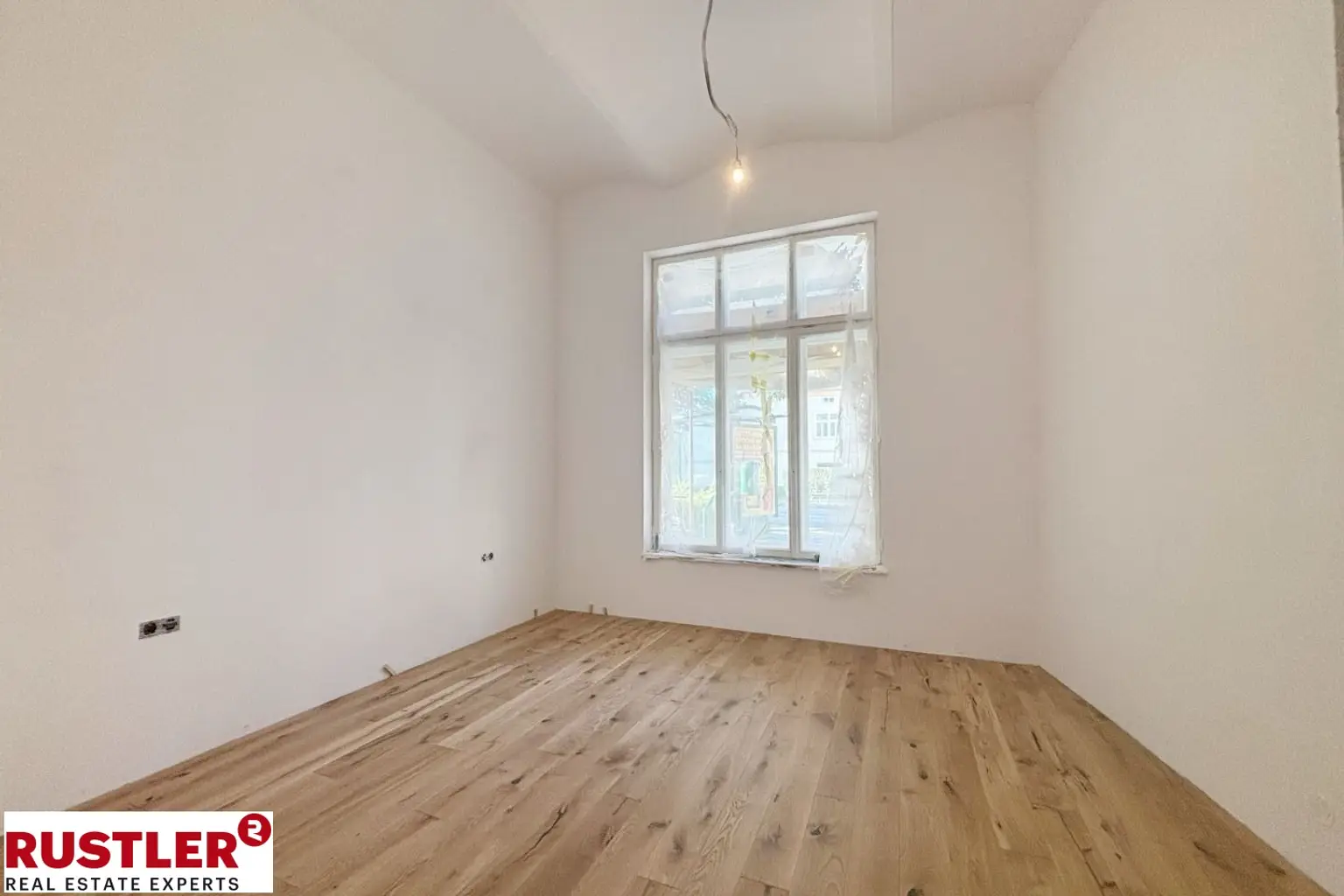 Stadtleben und Ruhe vereint: 2-Zimmer-Wohnung mit privater Innenhofterrasse