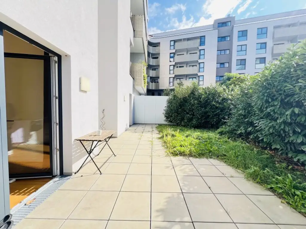 Q11 - Charmante Gartenwohnung: Lichtdurchflutet und Perfekt Aufgeteilt