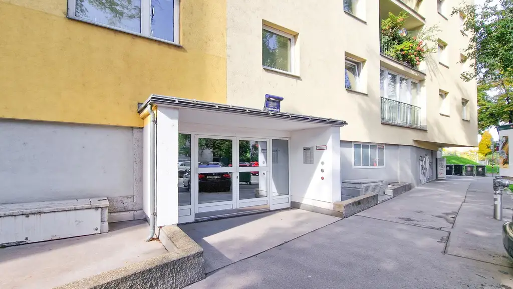 Helle Eigentumswohnung mit Grünblick im 3. Liftstock eines thermisch sanierten Hauses