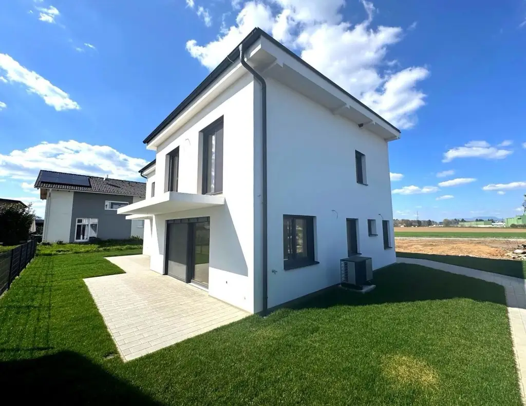 Sonnige Doppelhaushälfte mit Doppelcarport, Kellerersatzraum und großer Südterrasse!