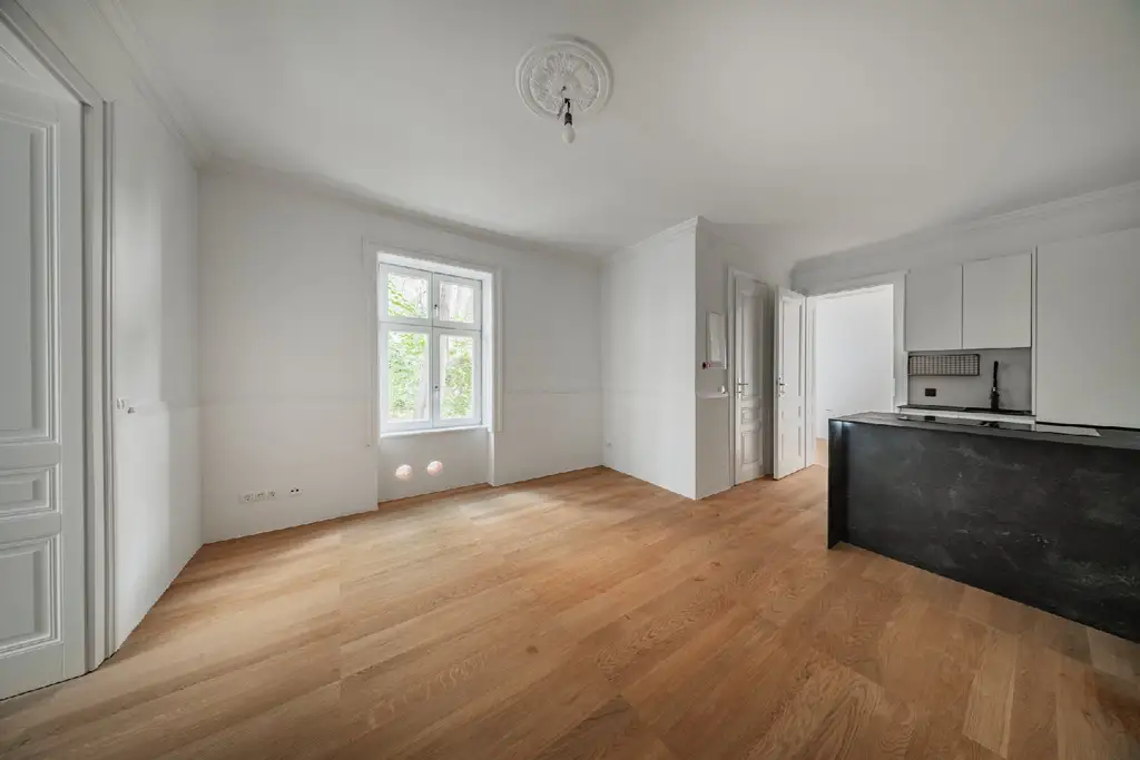 Exklusive Gartenwohnung am Rochusmarkt – Wohnen im spätbarocken Juwel