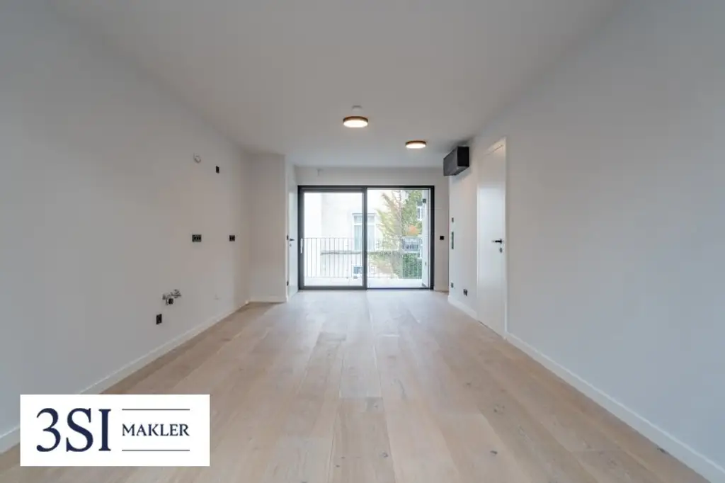 Urbaner Wohnkomfort mit Charme und Grünblick – stilvolle 3-Zimmer-Wohnung mit Balkon in ruhiger Innenhoflage