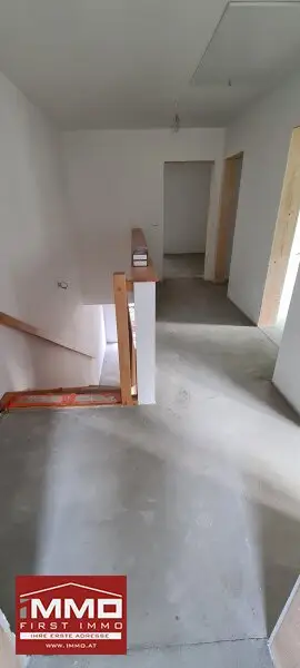 ***ERSTBEZUGS-DOPPELHAUSHÄLFTE DIREKT AM WASSER MIT SÜD-GARTEN!***