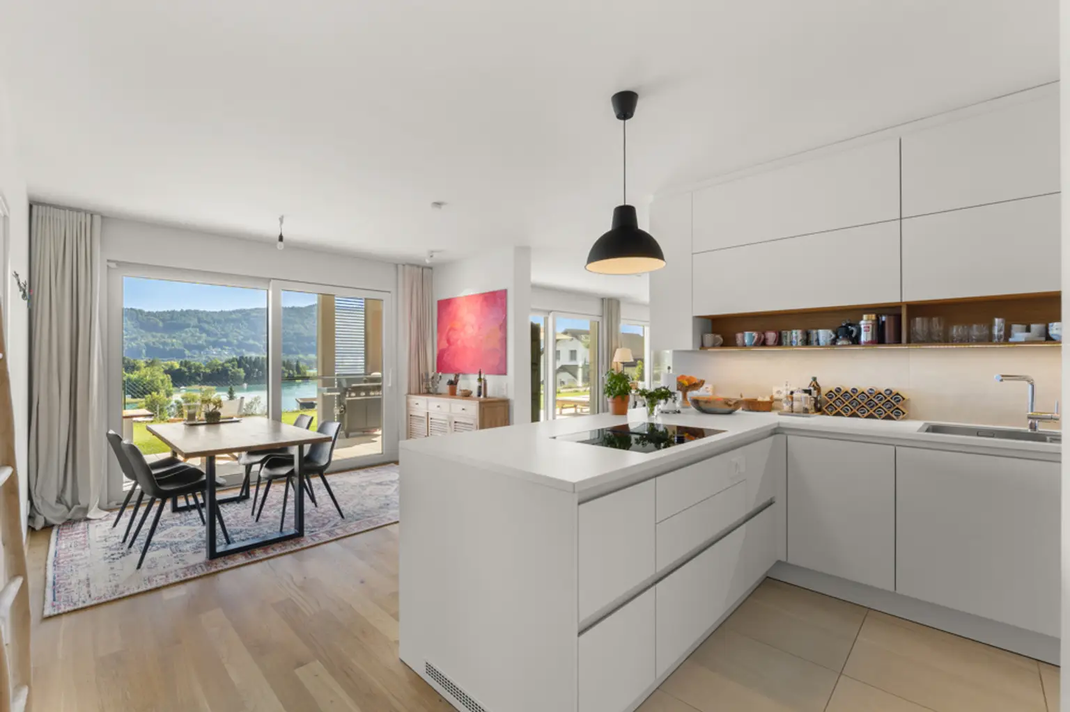 Neuwertige Gartenwohnung mit faszinierendem Seeblick