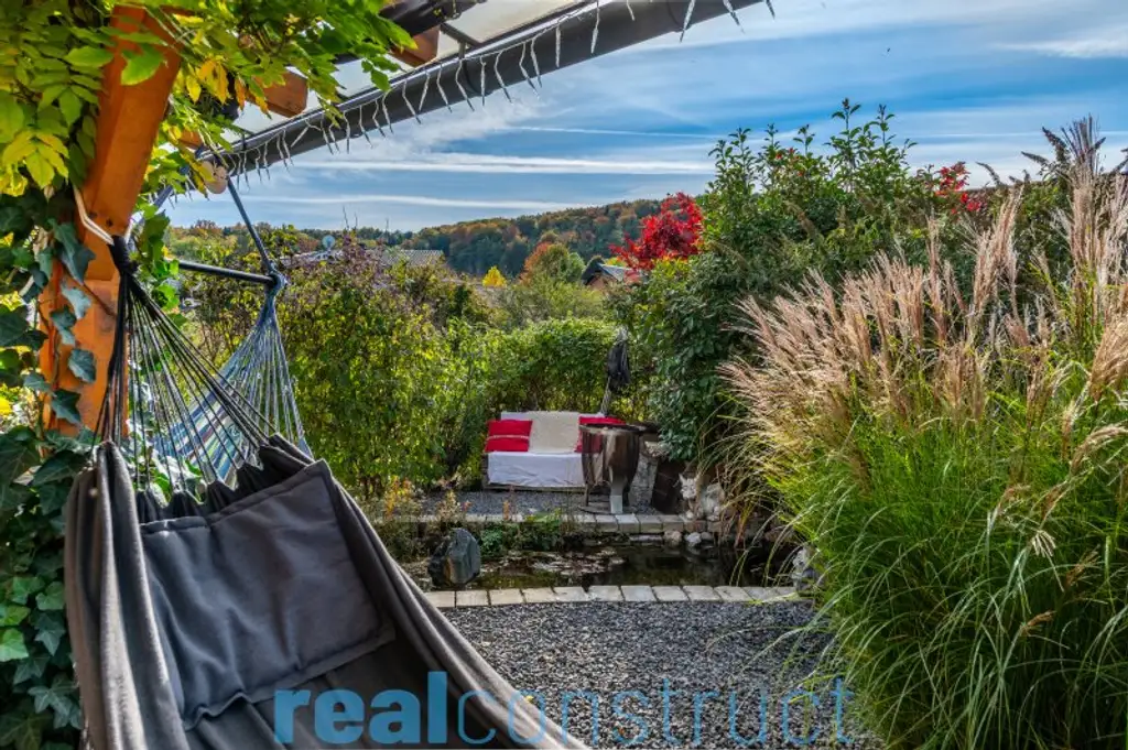 Ökologisch nachhaltiges Einfamilienhaus mit ERDWÄRME-Heizung in bester Lage von Bad Erlach