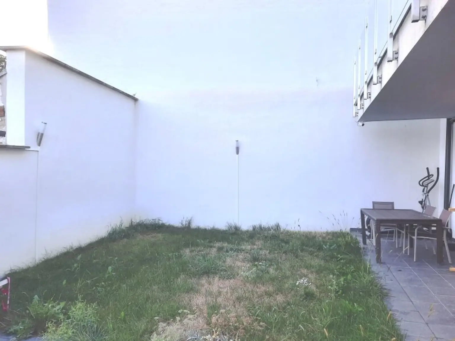 Anlegerpaket in Baden: 2 Wohnungen, 2 Stadthäuser und 4 Stellplätze