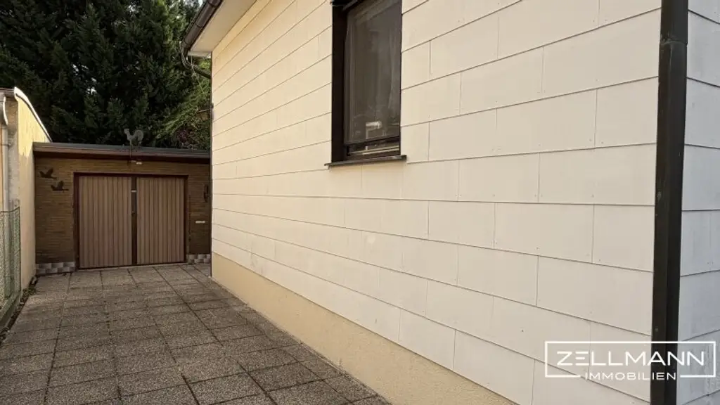 Wohnen mit Potenzial: Sanierungsbedürftiges Einfamilienhaus mit Garten und Nebengebäuden in Liesing | ZELLMANN IMMOBILIEN