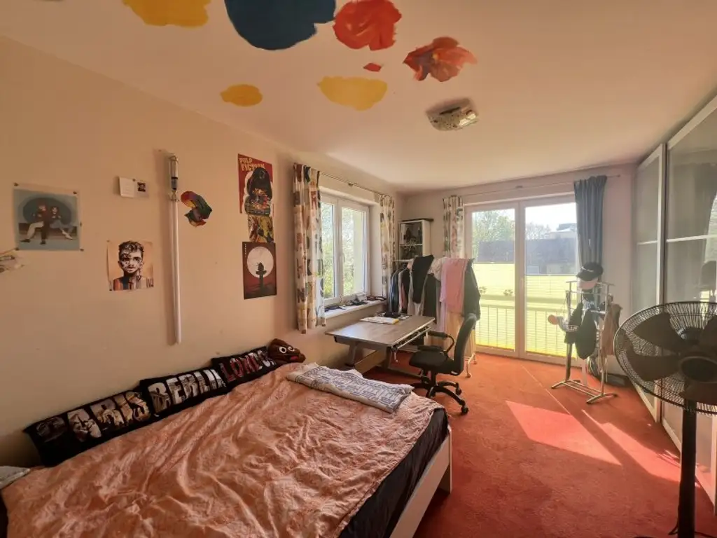 Moderne, zentrumsnahe Familienvilla mit großem Garten in gefragter Grünruhelage (!)