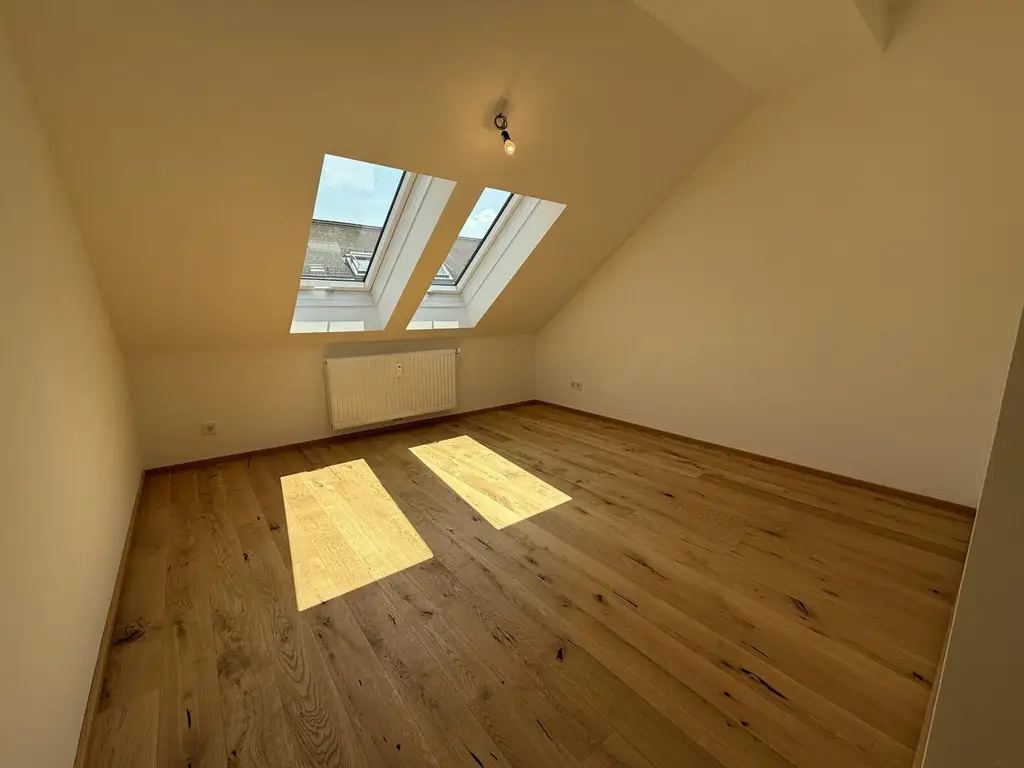 Erstbezug: Moderne Dachgeschosswohnung mit Balkon und Lift in begehrter Lage nahe dem Lendplatz K6/11
