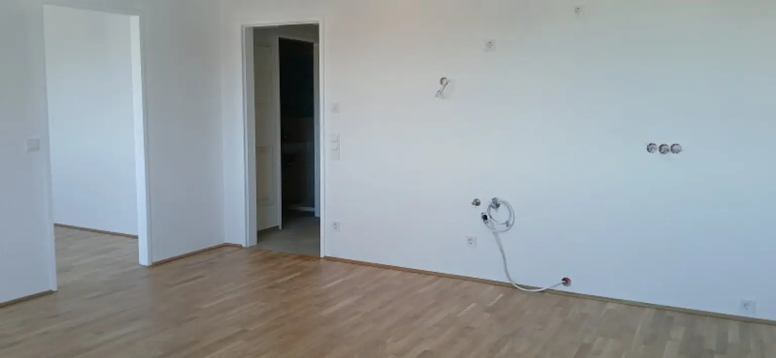 TOP 2.7 - NEUBAU - ERSTBEZUG - 2 Zimmerwohnung mit eigenem Tiefgaragenplatz