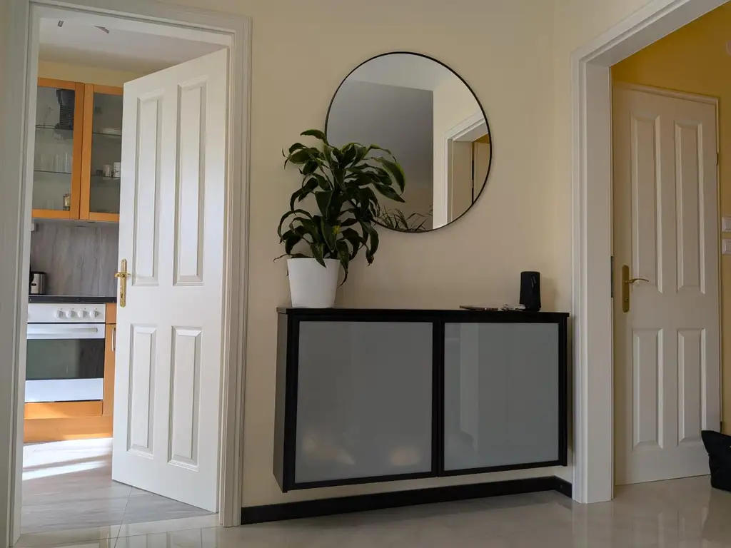 Traumhafte 2-Zimmer-Wohnung mit Penthouse-Flair und Weitblick durch den Wintergarten