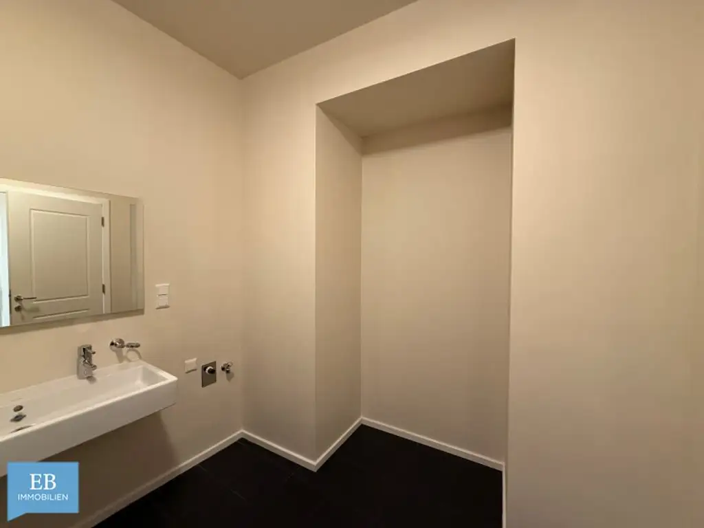 Helle Familienwohnung mit feiner Farbwelt und Fitnessraum im Haus