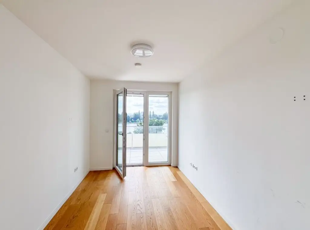 3-Zimmer-Wohnung mit Balkon & Blick auf die Alte Donau – Top-Zustand, klimatisiert, zentral begehbar!